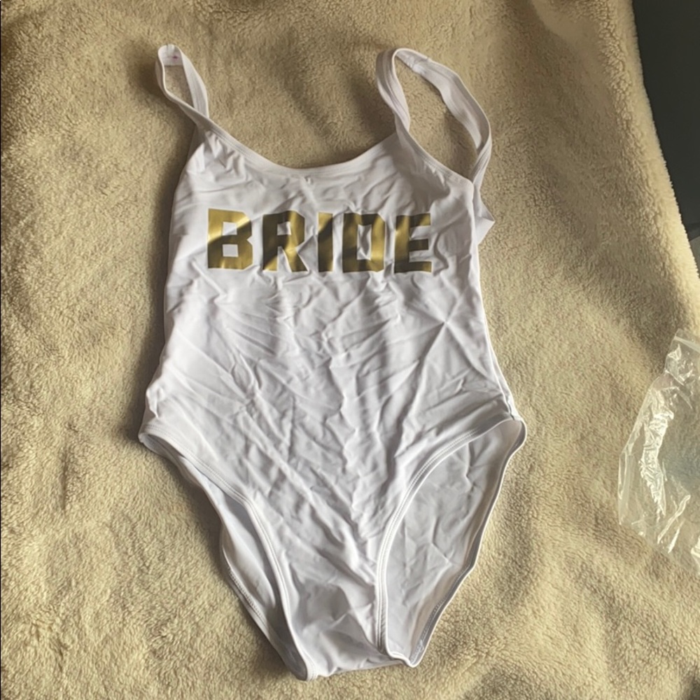 Never worn “bride” one piece swim suit